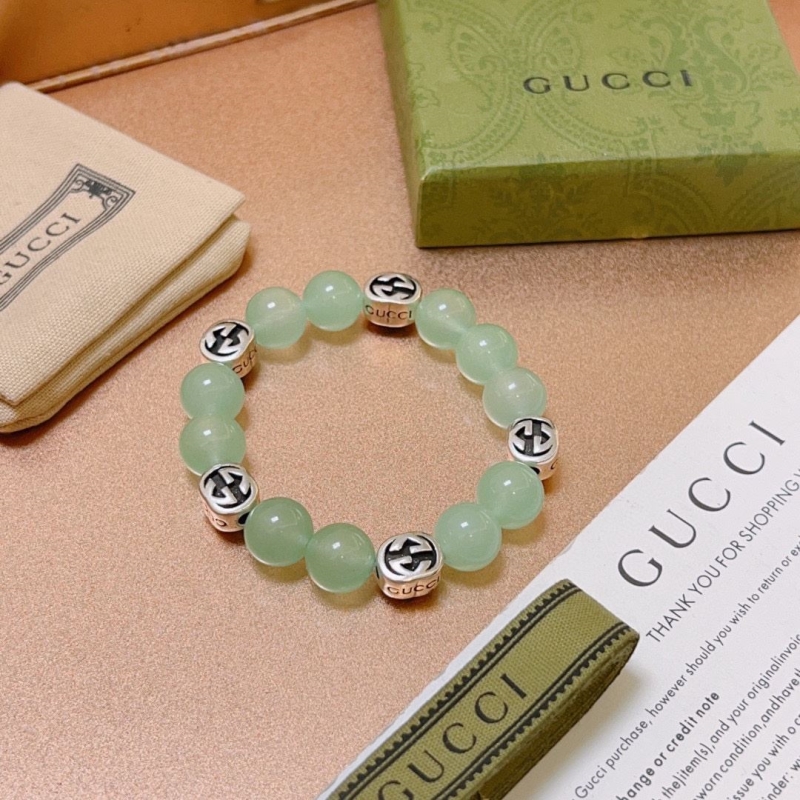 G*u*i bracelets